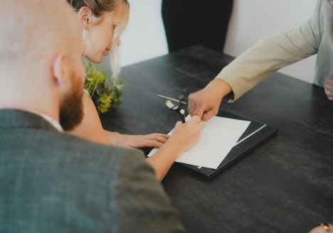 a couple signing a marital agreement in california