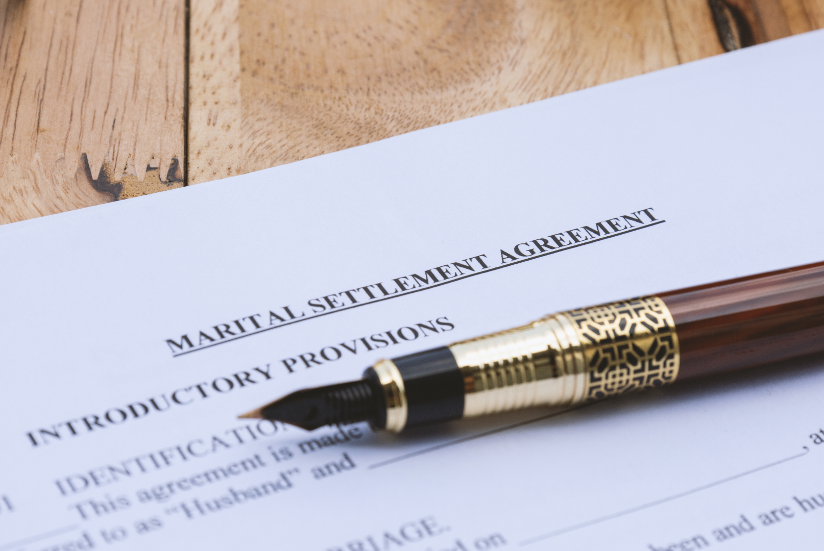 I pen on a marital settlement agreement contract